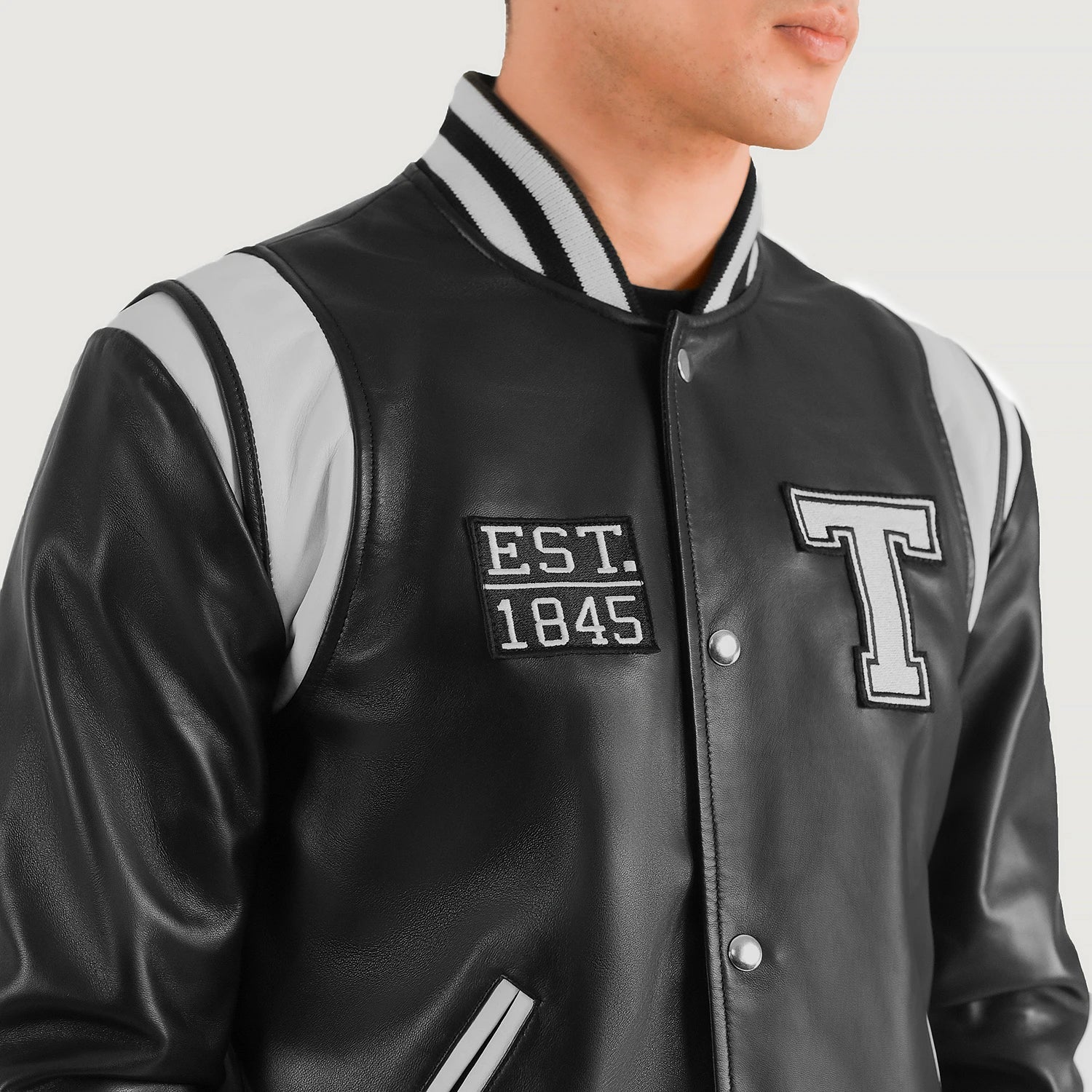 tcr BY TOUCHER VARSITY LEATHER JACKET Terrance Black & Red Leather